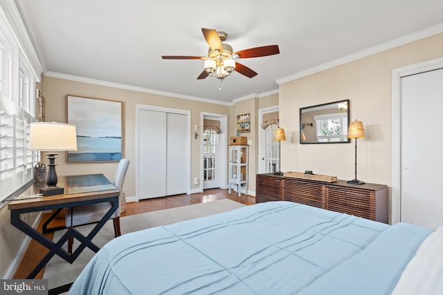 bedroom featuring baseboards, ceiling fan, wood finished floors, and crown molding