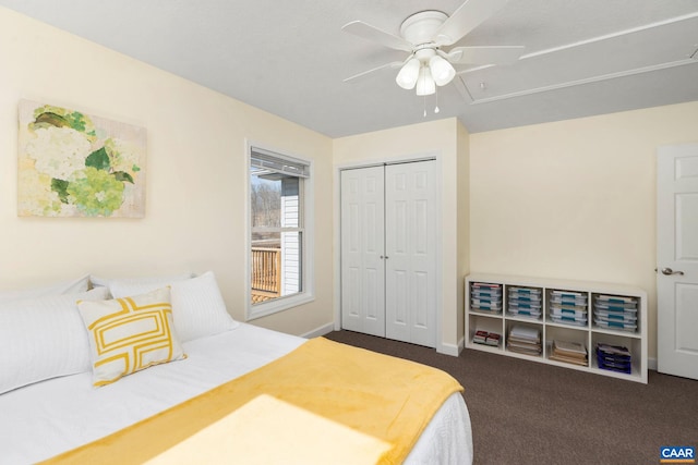 bedroom with carpet floors, a closet, ceiling fan, and baseboards