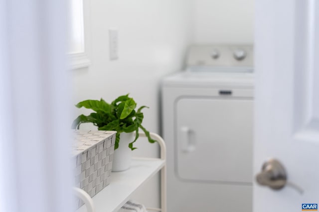 interior space with laundry area and washing machine and dryer