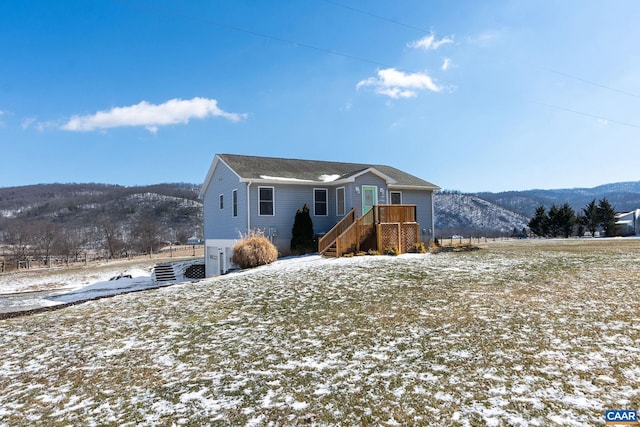 view of front of home featuring a mountain view and stairs