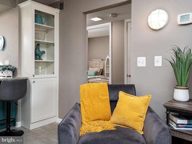 sitting room with visible vents