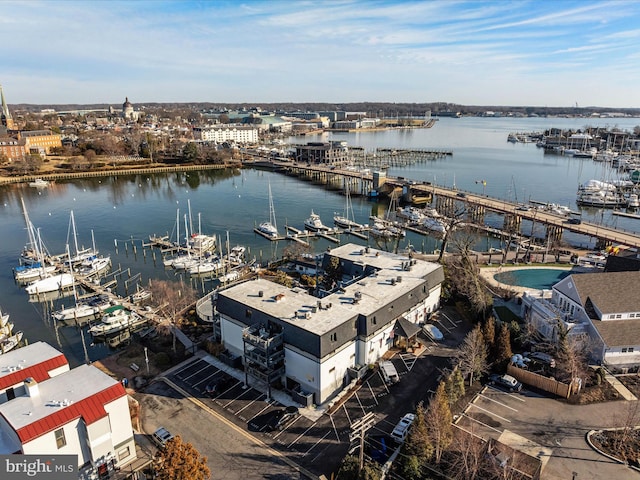 birds eye view of property featuring a water view