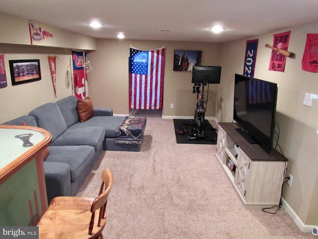 carpeted living room featuring baseboards and recessed lighting