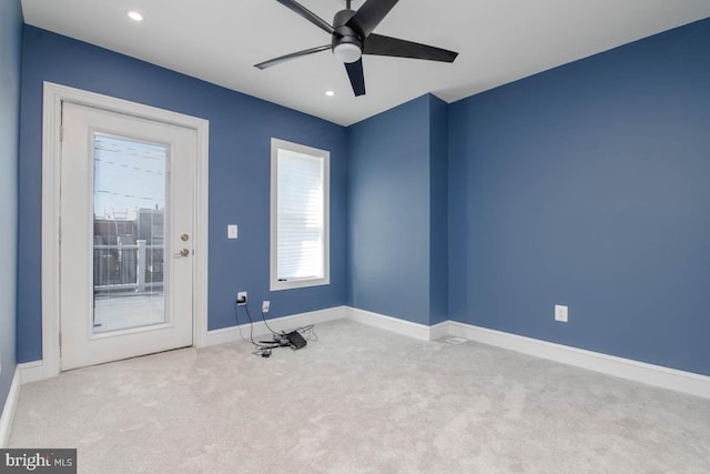 unfurnished room with recessed lighting, carpet flooring, a ceiling fan, and baseboards