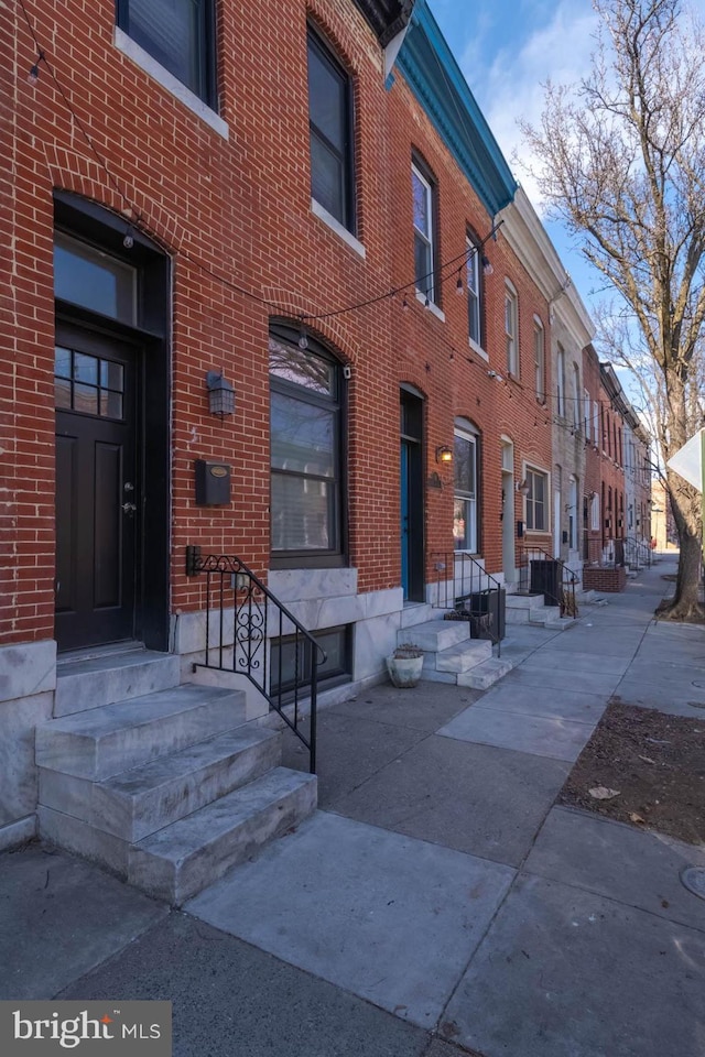 view of building exterior featuring entry steps