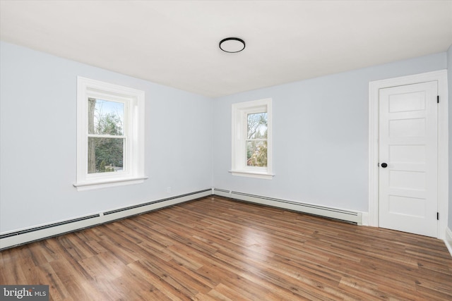 117 Morningside Dr, Trenton, NJ 08618 - unfurnished room with a baseboard radiator and wood finished floors