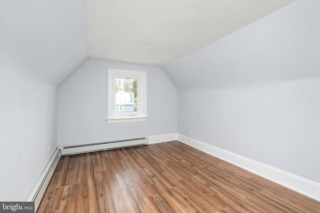 117 Morningside Dr, Trenton, NJ 08618 - additional living space featuring a baseboard heating unit, baseboards, wood finished floors, and lofted ceiling