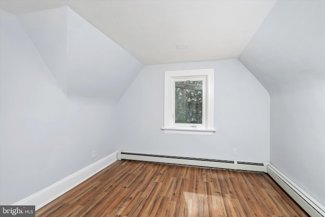 117 Morningside Dr, Trenton, NJ 08618 - additional living space featuring vaulted ceiling, a baseboard heating unit, baseboard heating, and wood finished floors