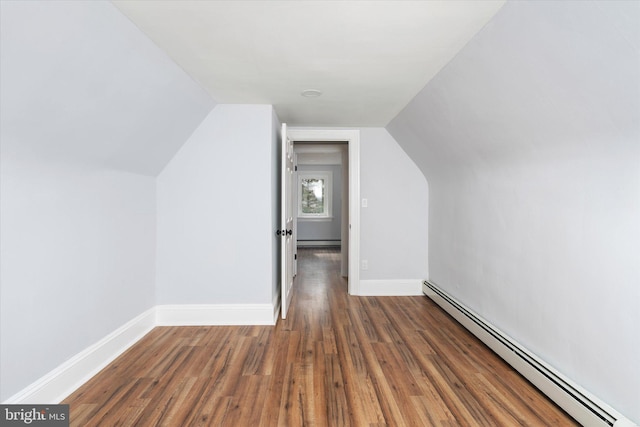 117 Morningside Dr, Trenton, NJ 08618 - bonus room featuring baseboards, dark wood-style floors, a baseboard radiator, vaulted ceiling, and a baseboard heating unit