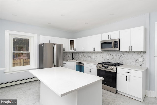 117 Morningside Dr, Trenton, NJ 08618 - kitchen with glass insert cabinets, appliances with stainless steel finishes, a center island, light countertops, and white cabinetry