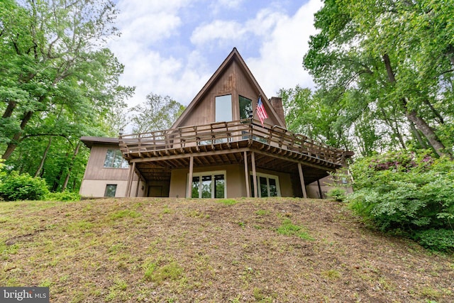 15431 Machodoc Dr, King George, VA 22485 - back of property with a deck and a chimney