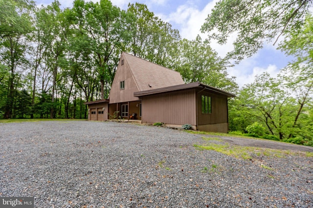 15431 Machodoc Dr, King George, VA 22485 - view of home's exterior featuring driveway and an attached garage