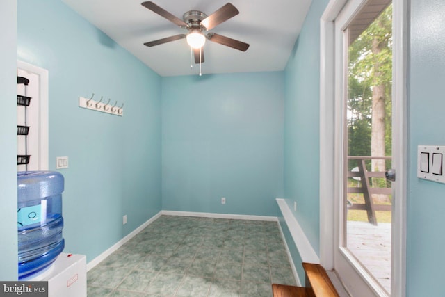15431 Machodoc Dr, King George, VA 22485 - empty room featuring ceiling fan, plenty of natural light, and baseboards