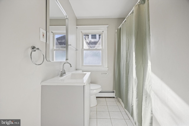 bathroom featuring toilet, a baseboard radiator, vanity, and tile patterned floors