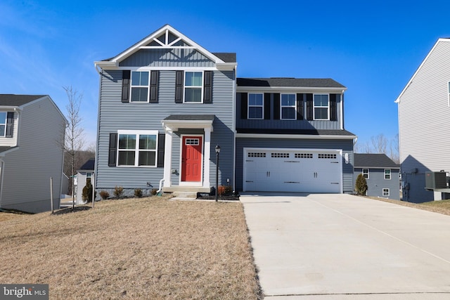 view of front of house featuring an attached garage, board and batten siding, and concrete driveway