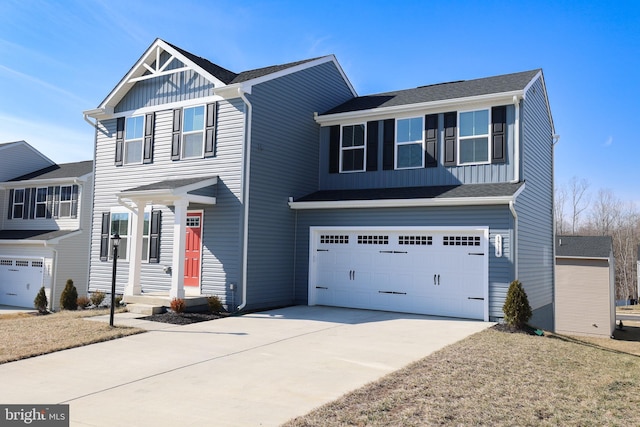 view of front of house featuring a garage, driveway, and board and batten siding