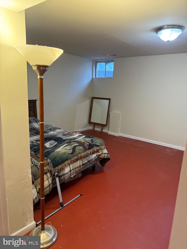 bedroom featuring baseboards