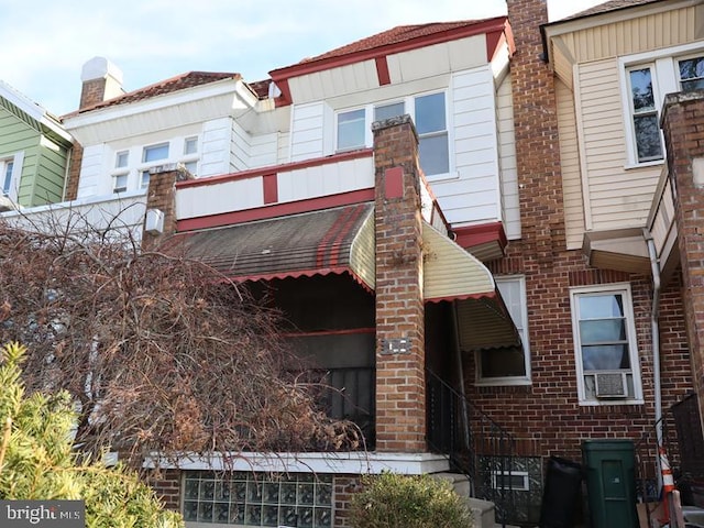 view of front of property with brick siding