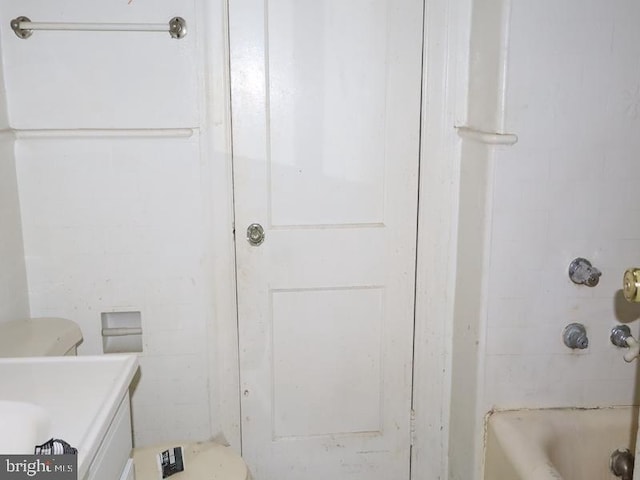 bathroom with vanity and toilet