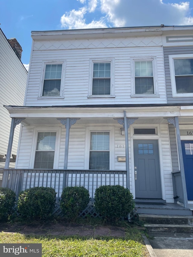 multi unit property featuring covered porch