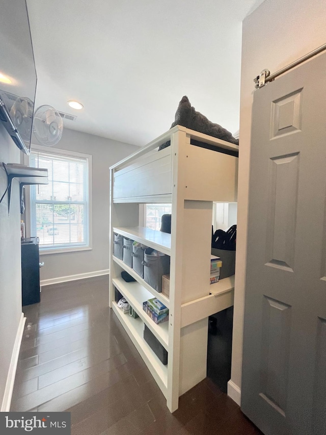 bedroom featuring dark wood-style flooring, recessed lighting, visible vents, and baseboards