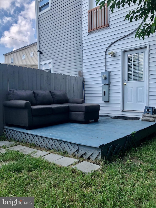 view of patio / terrace featuring fence and a wooden deck