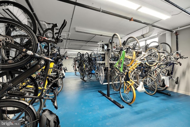 garage featuring bike storage and baseboards