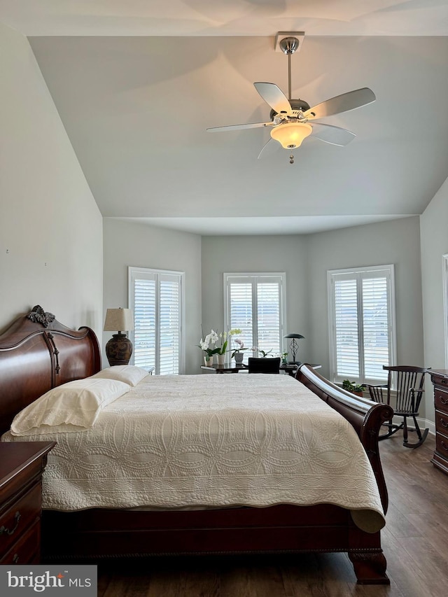 bedroom with a ceiling fan and wood finished floors