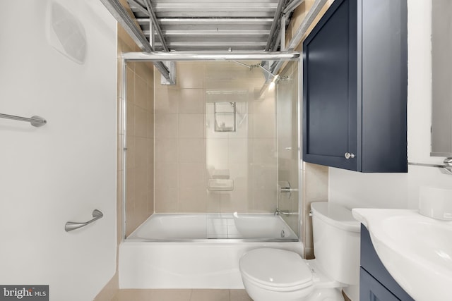 full bathroom featuring shower / bathtub combination, vanity, and toilet