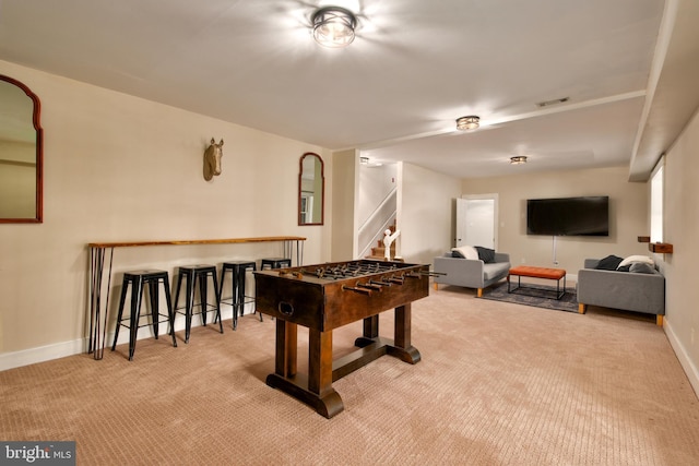 playroom featuring carpet flooring, visible vents, and baseboards