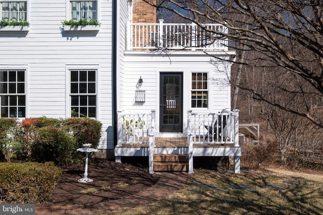 doorway to property with a balcony