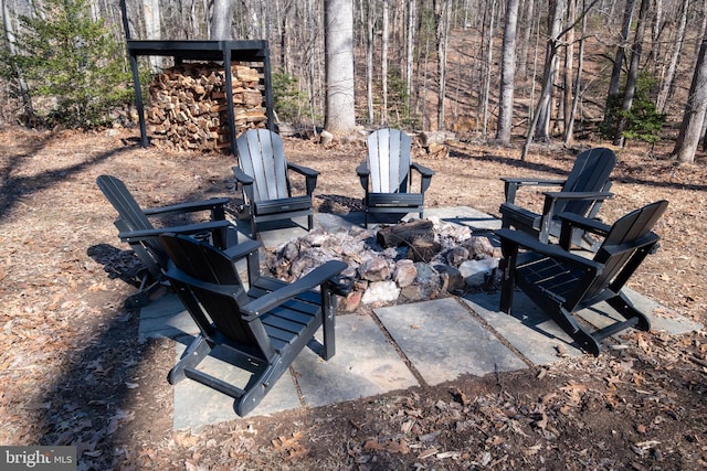 view of patio featuring a fire pit