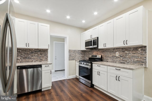 kitchen featuring white cabinets and stainless steel appliances