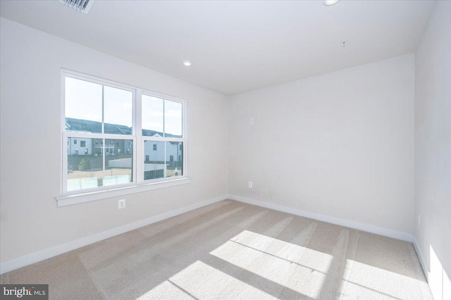 7508 Blue Sun Dr, Glen Burnie, MD 21060 - spare room featuring light carpet, baseboards, and recessed lighting