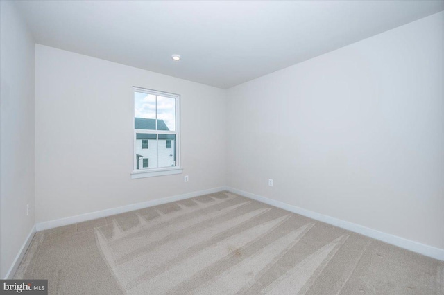 7508 Blue Sun Dr, Glen Burnie, MD 21060 - spare room with recessed lighting, light colored carpet, and baseboards