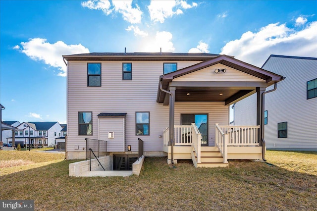 7508 Blue Sun Dr, Glen Burnie, MD 21060 - rear view of house featuring a wooden deck and a yard