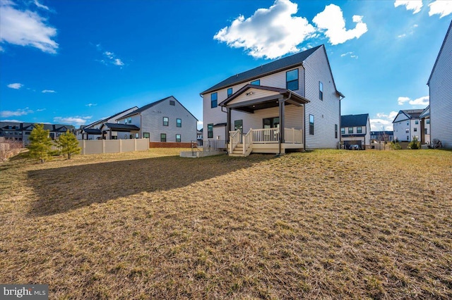 7508 Blue Sun Dr, Glen Burnie, MD 21060 - rear view of house with a wooden deck, a residential view, and fence