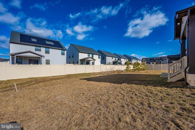7508 Blue Sun Dr, Glen Burnie, MD 21060 - view of yard featuring a residential view and fence