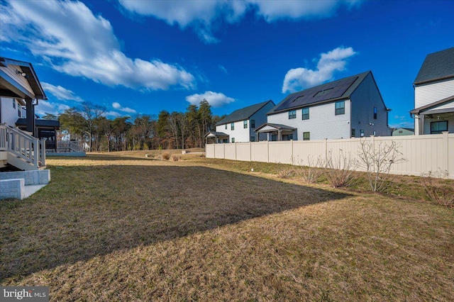 7508 Blue Sun Dr, Glen Burnie, MD 21060 - view of yard featuring a residential view and fence
