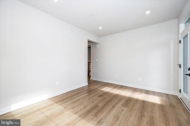 7508 Blue Sun Dr, Glen Burnie, MD 21060 - unfurnished room featuring recessed lighting, wood finished floors, and baseboards
