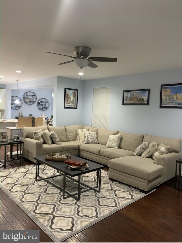 living room featuring recessed lighting, ceiling fan, and wood finished floors