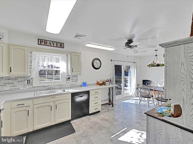 kitchen with a healthy amount of sunlight, black dishwasher, visible vents, and a sink