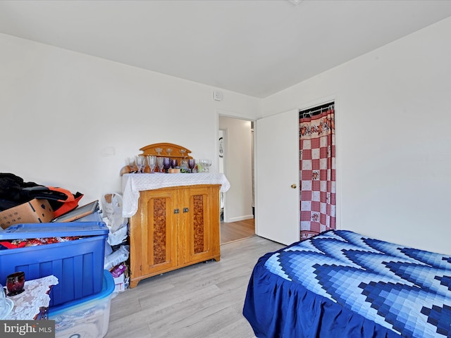 bedroom featuring light wood-type flooring