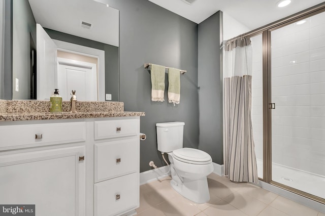 full bath with toilet, a stall shower, visible vents, and tile patterned floors