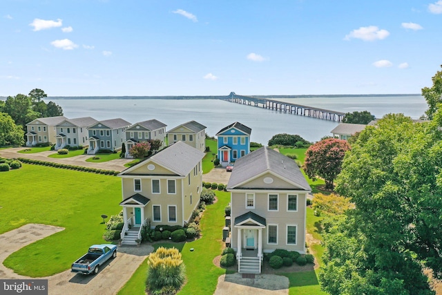 aerial view with a water view and a residential view