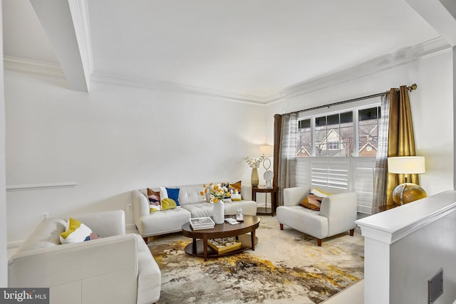 living area with ornamental molding