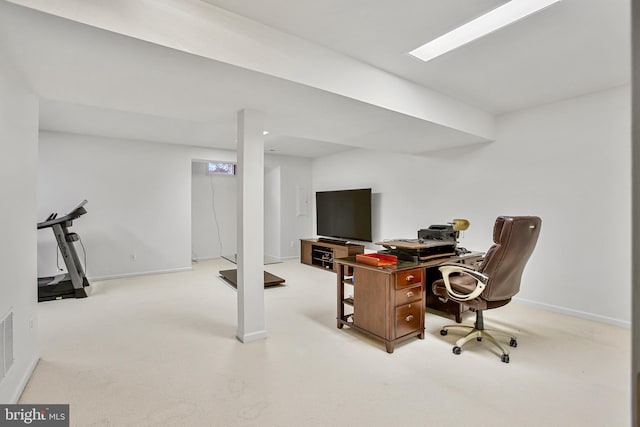 home office featuring light carpet, visible vents, and baseboards