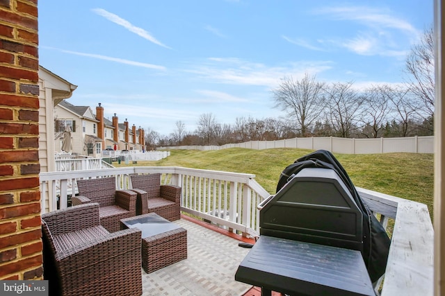 view of patio / terrace featuring fence