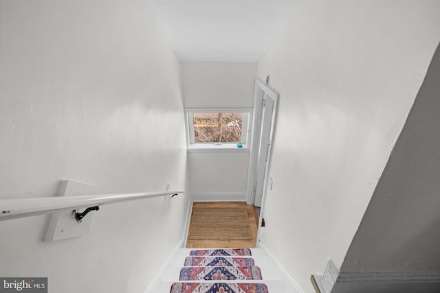 stairway with baseboards