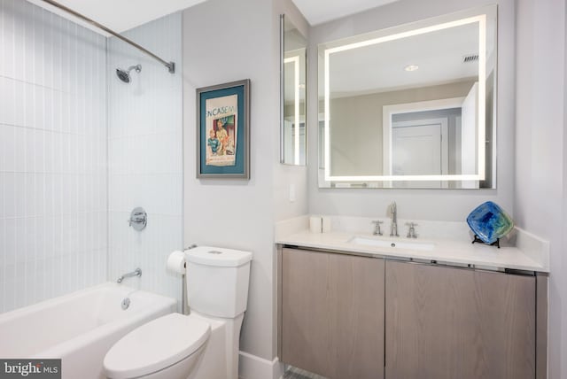 bathroom featuring visible vents, vanity, shower / tub combination, and toilet